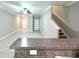Open living area features tile floors and a ceiling fan at 11823 Dumaine Valley Rd, Riverview, FL 33579