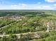 Aerial view of the community and landscape on a sunny day at 12430 Oconee Blvd, New Port Richey, FL 34654