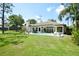 Beautiful pool, and lush landscaping create a serene backyard oasis for relaxation and enjoyment at 1311 Fallsmeade Ct, Oldsmar, FL 34677