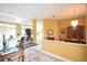Traditional dining room with chandelier and views to other rooms at 1311 Fallsmeade Ct, Oldsmar, FL 34677