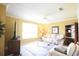 Cozy living room with comfortable seating, a ceiling fan, and natural light at 1311 Fallsmeade Ct, Oldsmar, FL 34677