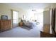 Spacious main bedroom with natural light, ceiling fan, and neutral colors, creating a serene and inviting atmosphere at 1311 Fallsmeade Ct, Oldsmar, FL 34677
