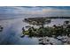 Stunning aerial view of waterfront homes with boat docks on a beautiful bay at 1325 Snell Isle Ne Blvd # 607, St Petersburg, FL 33704