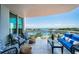 Spacious balcony with cozy furniture and stunning waterfront views, perfect for relaxing and entertaining at 1325 Snell Isle Ne Blvd # 607, St Petersburg, FL 33704