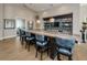 A stylish bar area with a sleek countertop, modern seating, and sophisticated decor at 1325 Snell Isle Ne Blvd # 607, St Petersburg, FL 33704