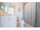 Modern bathroom featuring a walk-in shower, vanity with white cabinets and light walls and floors at 1325 Snell Isle Ne Blvd # 607, St Petersburg, FL 33704