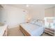 Bedroom with bright natural light, light walls, a cozy bed, and matching nightstands and dresser at 1325 Snell Isle Ne Blvd # 607, St Petersburg, FL 33704