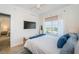 Bright bedroom with large windows, stylish decor, and comfortable furnishings at 1325 Snell Isle Ne Blvd # 607, St Petersburg, FL 33704