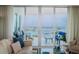 Bright living room showcasing balcony access and water views at 1325 Snell Isle Ne Blvd # 607, St Petersburg, FL 33704