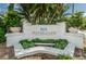 Elegant 'Water Club Snell Isle' signage surrounded by lush landscaping and mature palm trees at 1325 Snell Isle Ne Blvd # 607, St Petersburg, FL 33704