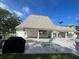 Community Poolside lounge areas offer a relaxing spot for residents, with a poolside BBQ at 1370 Heather Ridge Blvd # 310, Dunedin, FL 34698