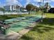Enjoy outdoor activities with the community shuffleboard courts and benches at 1370 Heather Ridge Blvd # 310, Dunedin, FL 34698