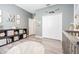 Bedroom with closet, bookshelf and wood-look flooring at 1418 Rushgrove Cir, Dover, FL 33527
