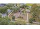 Aerial view of community playground featuring mature trees, shade, and walking paths at 1418 Rushgrove Cir, Dover, FL 33527