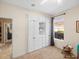 Bedroom with built in closet, neutral carpet, and light walls at 15254 Bellamy Rd, Tampa, FL 33625
