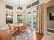 Bright breakfast nook features pool views and lots of light at 15254 Bellamy Rd, Tampa, FL 33625