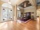 Elegant dining room with beautiful floors, tray ceiling, and natural light streaming in at 15254 Bellamy Rd, Tampa, FL 33625