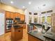 Well-equipped kitchen with granite countertops, stainless steel appliances, and ample cabinet space at 15254 Bellamy Rd, Tampa, FL 33625