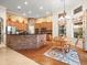 Eat-in kitchen has brick accent wall and breakfast nook at 15254 Bellamy Rd, Tampa, FL 33625