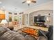 Open-concept living room with high ceilings and a tile floor at 15254 Bellamy Rd, Tampa, FL 33625