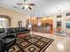 Open floor plan with living room, kitchen, and dining area at 15254 Bellamy Rd, Tampa, FL 33625