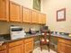 Dedicated office space features desk, drawers, and upper cabinets at 15254 Bellamy Rd, Tampa, FL 33625
