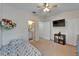 ' bedroom with adjacent bathroom and closet, complete with wall-mounted TV at 15825 Fishhawk View Dr, Lithia, FL 33547