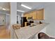 View of kitchen with stainless steel appliances and light wood cabinets at 15825 Fishhawk View Dr, Lithia, FL 33547