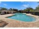 Community pool with a variety of amenities to enjoy the outdoors at 15825 Fishhawk View Dr, Lithia, FL 33547