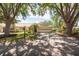 Charming single-story home with a two-car garage and mature landscaping at 1616 Laughton Pl, Sun City Center, FL 33573