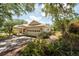 Charming single-story home with a two-car garage and beautiful landscaping at 1616 Laughton Pl, Sun City Center, FL 33573