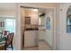 Convenient laundry room with shelving and direct access to the backyard at 1616 Laughton Pl, Sun City Center, FL 33573