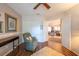 Relaxing living area with an open doorway and a closet with bi-fold doors at 1616 Laughton Pl, Sun City Center, FL 33573