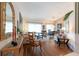 Inviting living room with wood floors, comfortable seating, and natural light at 1616 Laughton Pl, Sun City Center, FL 33573
