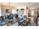 Open-concept living and dining area featuring modern decor and comfortable seating at 1616 Laughton Pl, Sun City Center, FL 33573