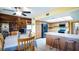 Bright, eat in kitchen with white tile, stainless appliances and breakfast bar at 1691 Ridge Top Dr, Tarpon Springs, FL 34688