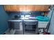 Updated laundry area with a new washer and dryer at 1691 Ridge Top Dr, Tarpon Springs, FL 34688