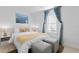 Inviting bedroom with a cozy bed, soft lighting, and stylish décor at 2215 Thrace St, Tampa, FL 33605