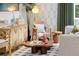 Relaxing living room with light wood accents, plush textiles, and eye-catching artwork at 2215 Thrace St, Tampa, FL 33605