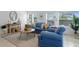 Relaxing living room with stylish decor, comfortable seating, and plenty of natural light at 2215 Thrace St, Tampa, FL 33605