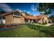 Beautiful single-Gathering home featuring manicured landscaping and a combination of brick and siding exterior at 2392 Hillcreek E Cir, Clearwater, FL 33759