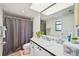 Bathroom with a clean white vanity and well lit mirror at 2427 Twin Dr # 2, Sarasota, FL 34234