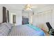 Bedroom featuring a comfortable bed, dresser, and closet space at 2427 Twin Dr # 2, Sarasota, FL 34234