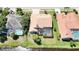 A beautiful home featuring a large screened in pool and overlooking a canal at 2679 Saddlewood Ln, Palm Harbor, FL 34685