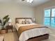 Inviting bedroom with a decorative rug and modern furnishings at 2679 Saddlewood Ln, Palm Harbor, FL 34685