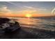 Waterfront with jet ski on the beach at sunset and stunning water views at 2679 Saddlewood Ln, Palm Harbor, FL 34685