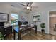 Office with wooden floors, ceiling fan, and large desk at 3008 Dupont S St, Gulfport, FL 33707
