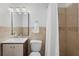 Full bathroom featuring a shower with tile surround, neutral colors, and modern fixtures at 3027 Burlington N Ave, St Petersburg, FL 33713