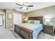 Spacious bedroom with ceiling fan and large closet at 3034 Mockingbird Ct, Clearwater, FL 33762