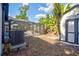 Spacious backyard with shed and enclosed pool area at 321 Shore E Dr, Oldsmar, FL 34677